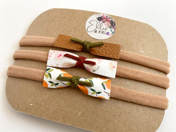 Faux Leather Mini Bows on Medium Tan Nylon